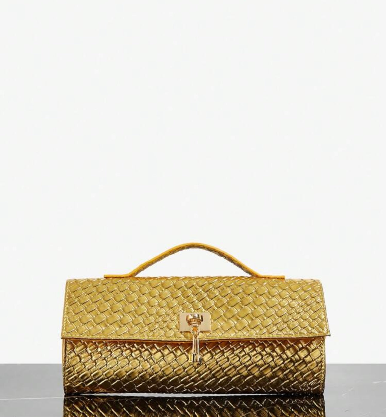 All gold top handle bag