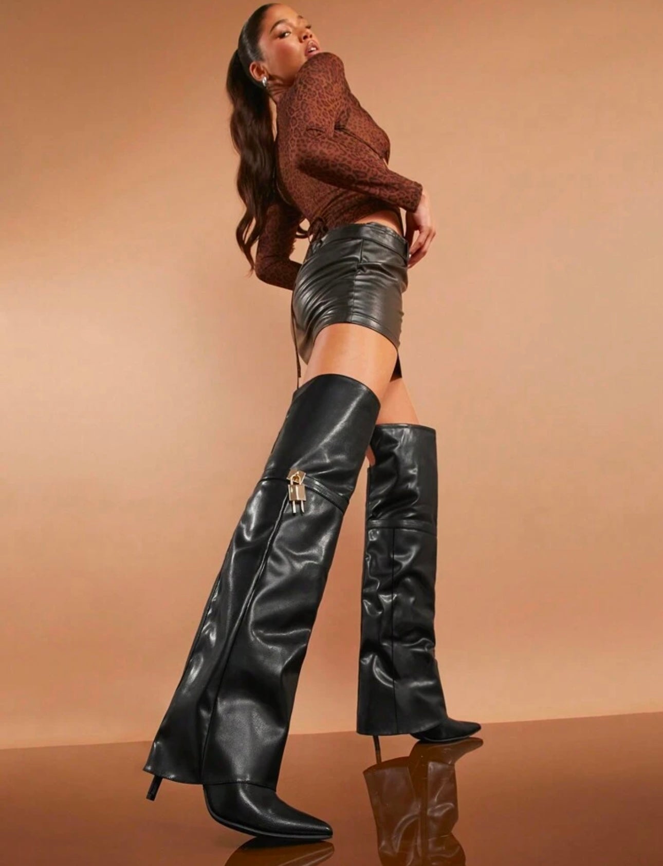 Folded Over The Boot With A Strap And Ornament