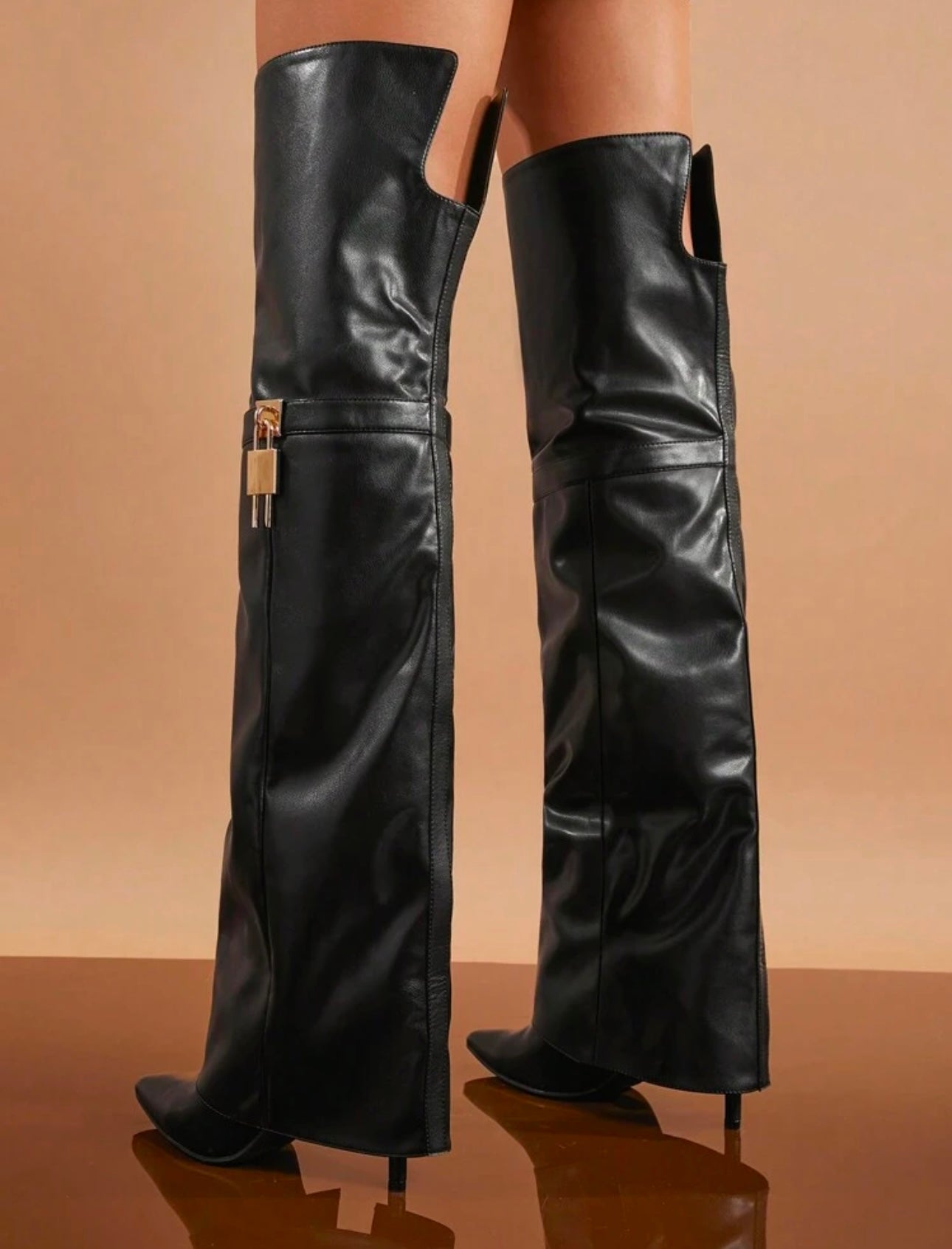 Folded Over The Boot With A Strap And Ornament