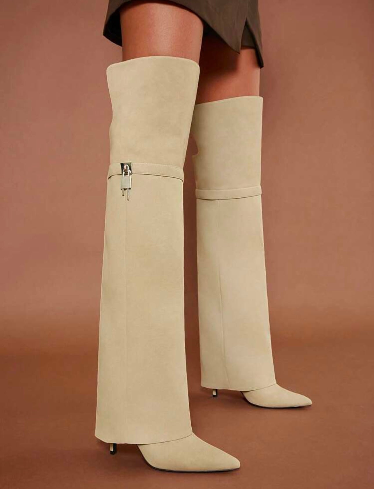 Folded Over The Boot With A Strap And Ornament