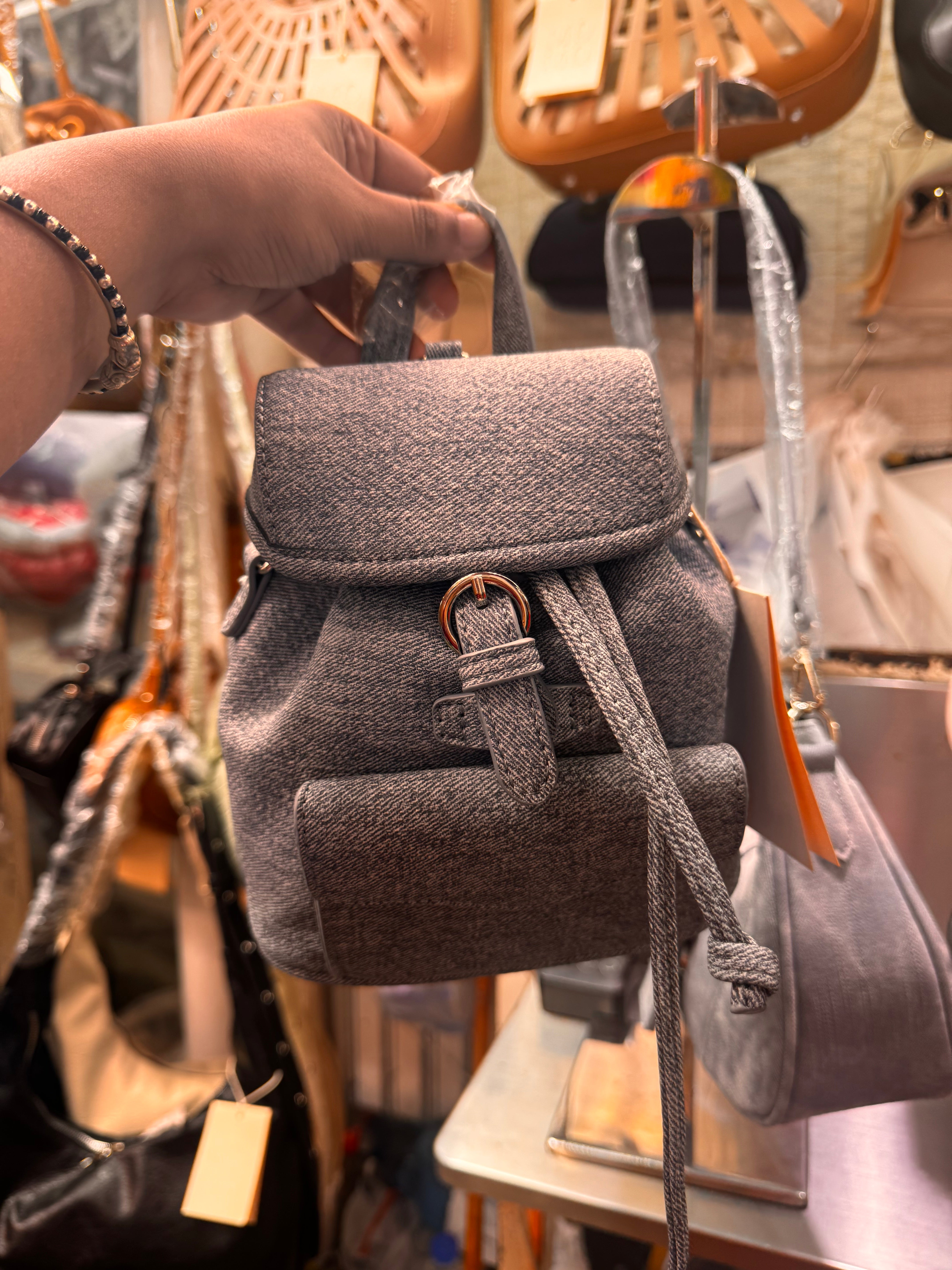 Mini denim bagpack