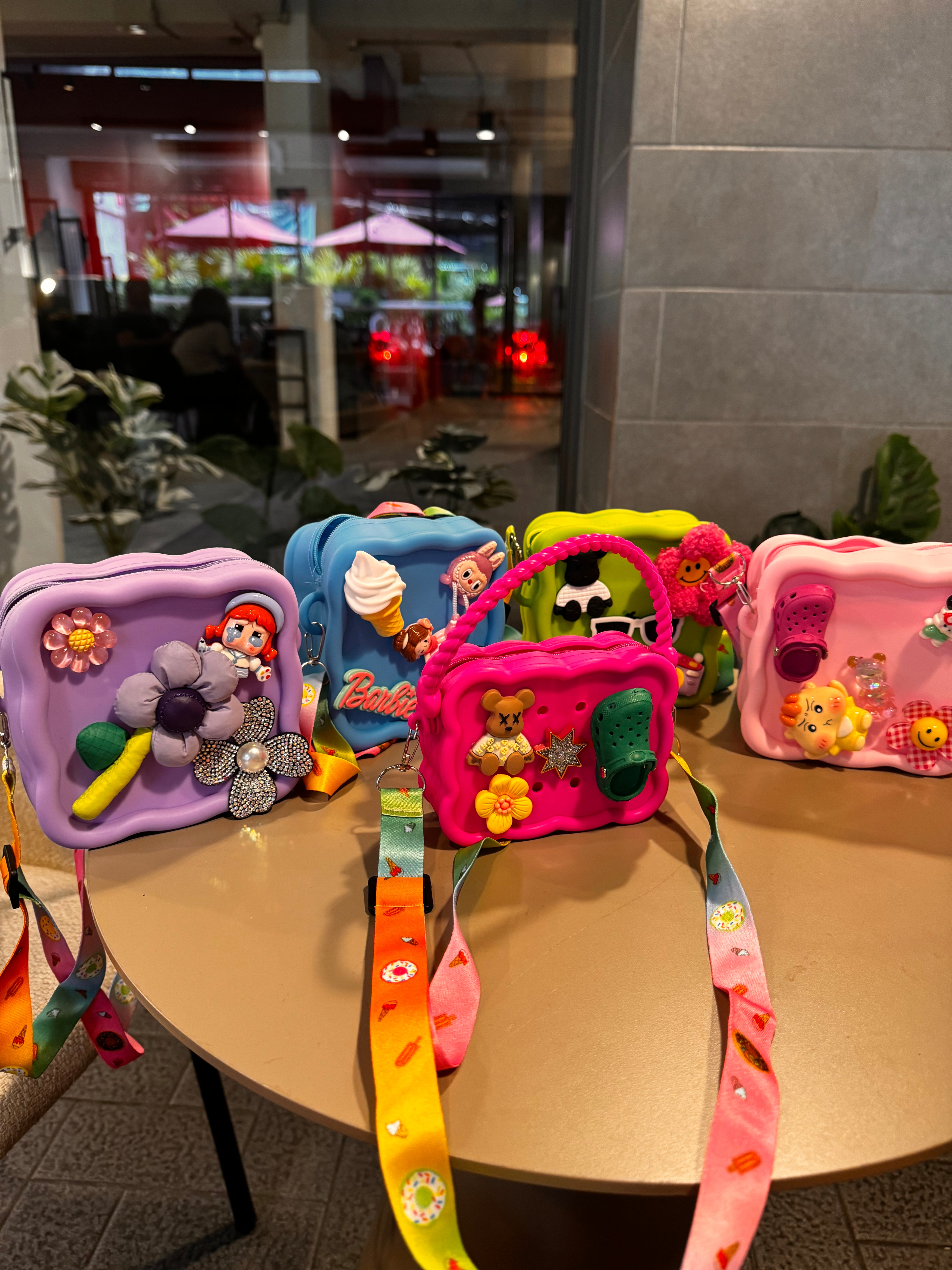 Kids silicon sling emoticon bag