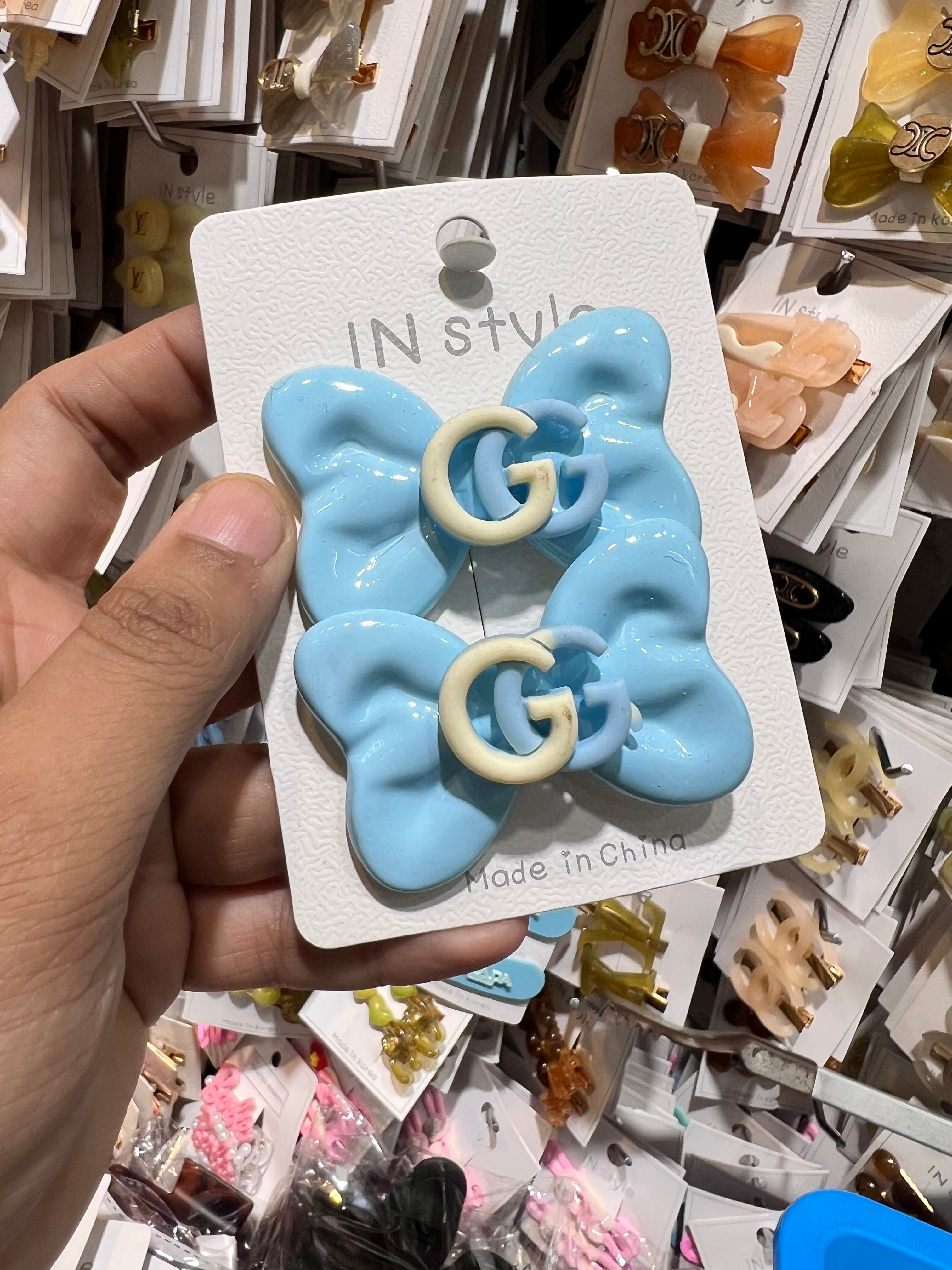 G Butterfly pin