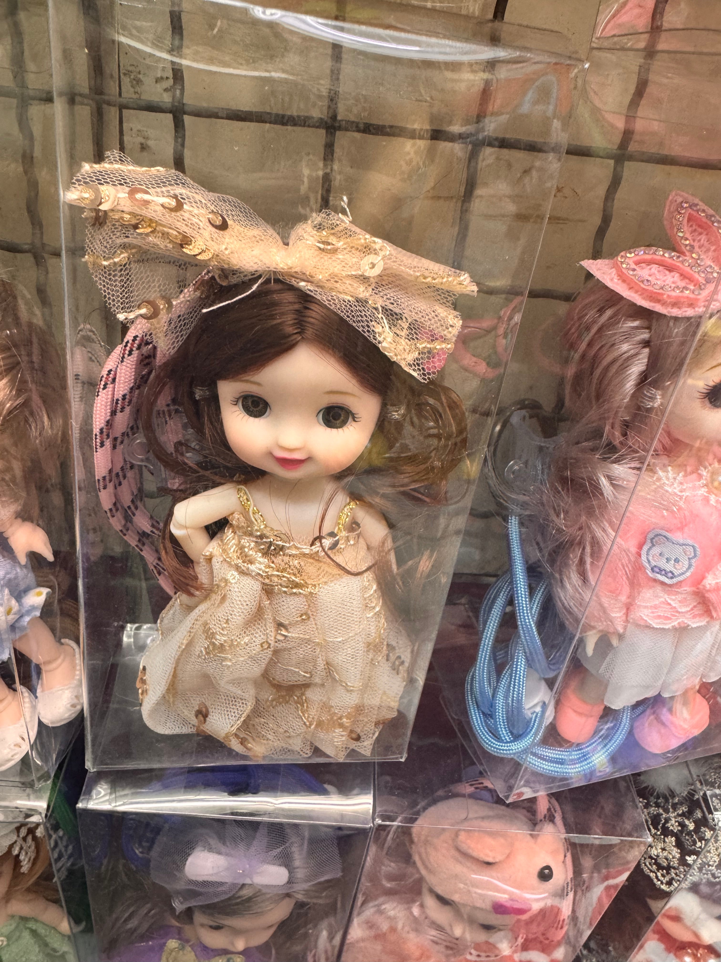 Doll phone holder