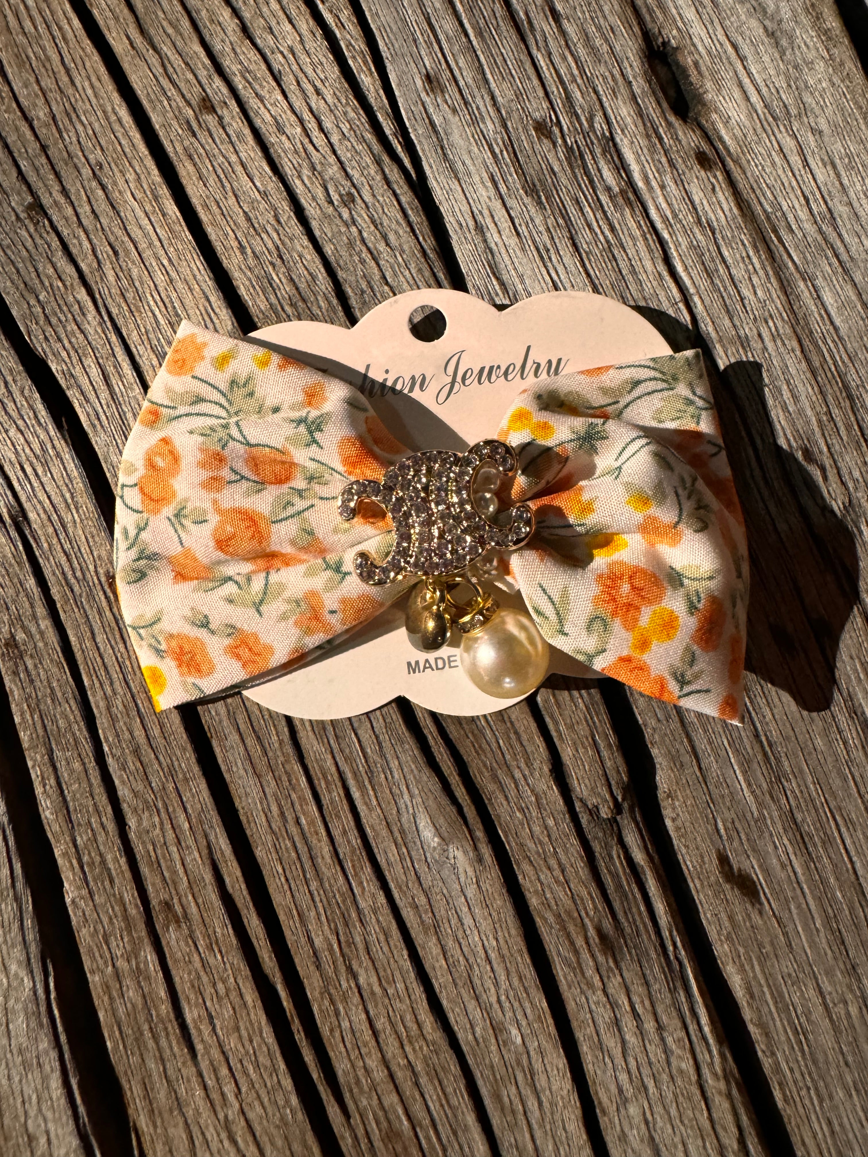 Floral pin bow