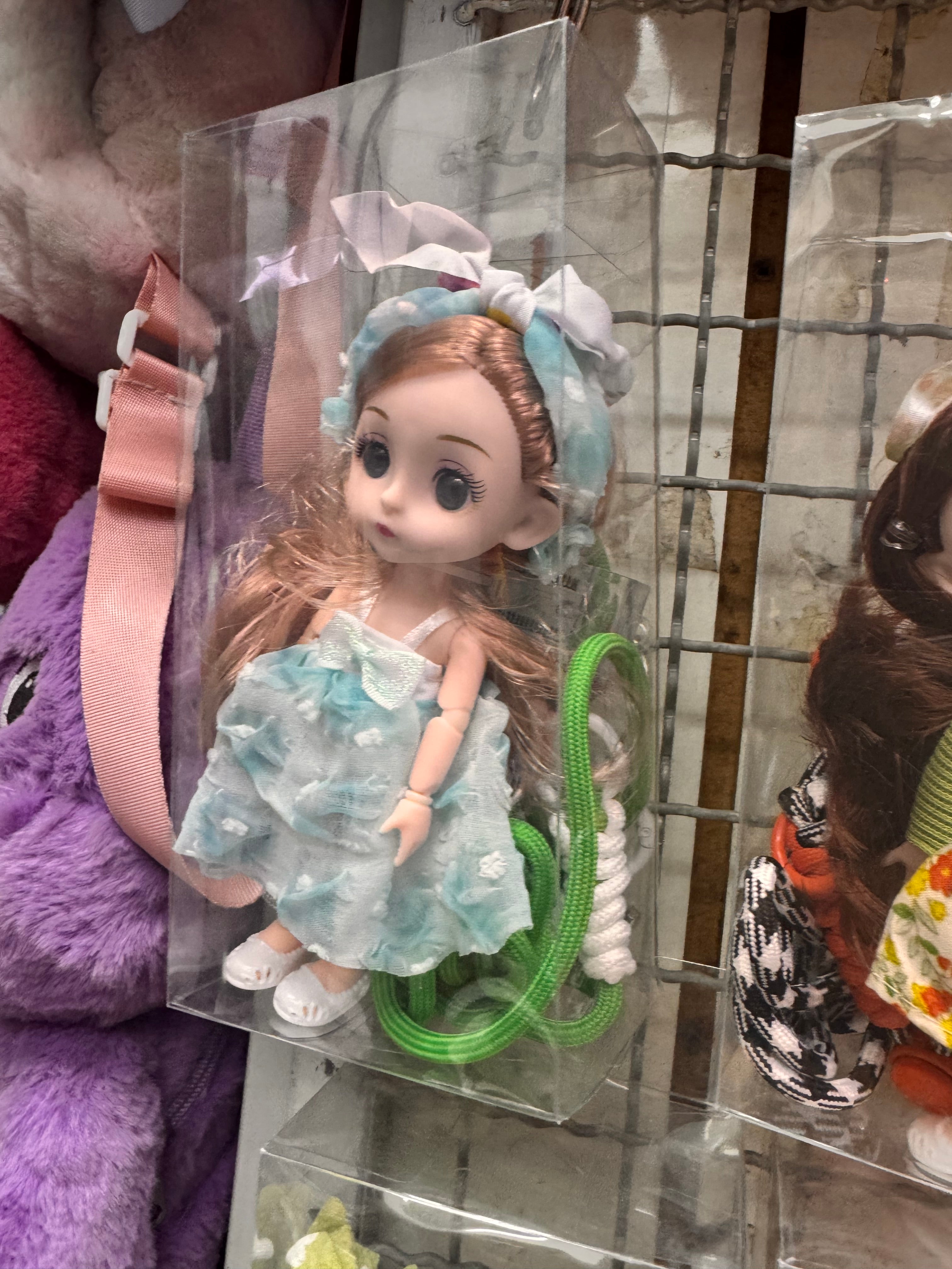 Doll phone holder