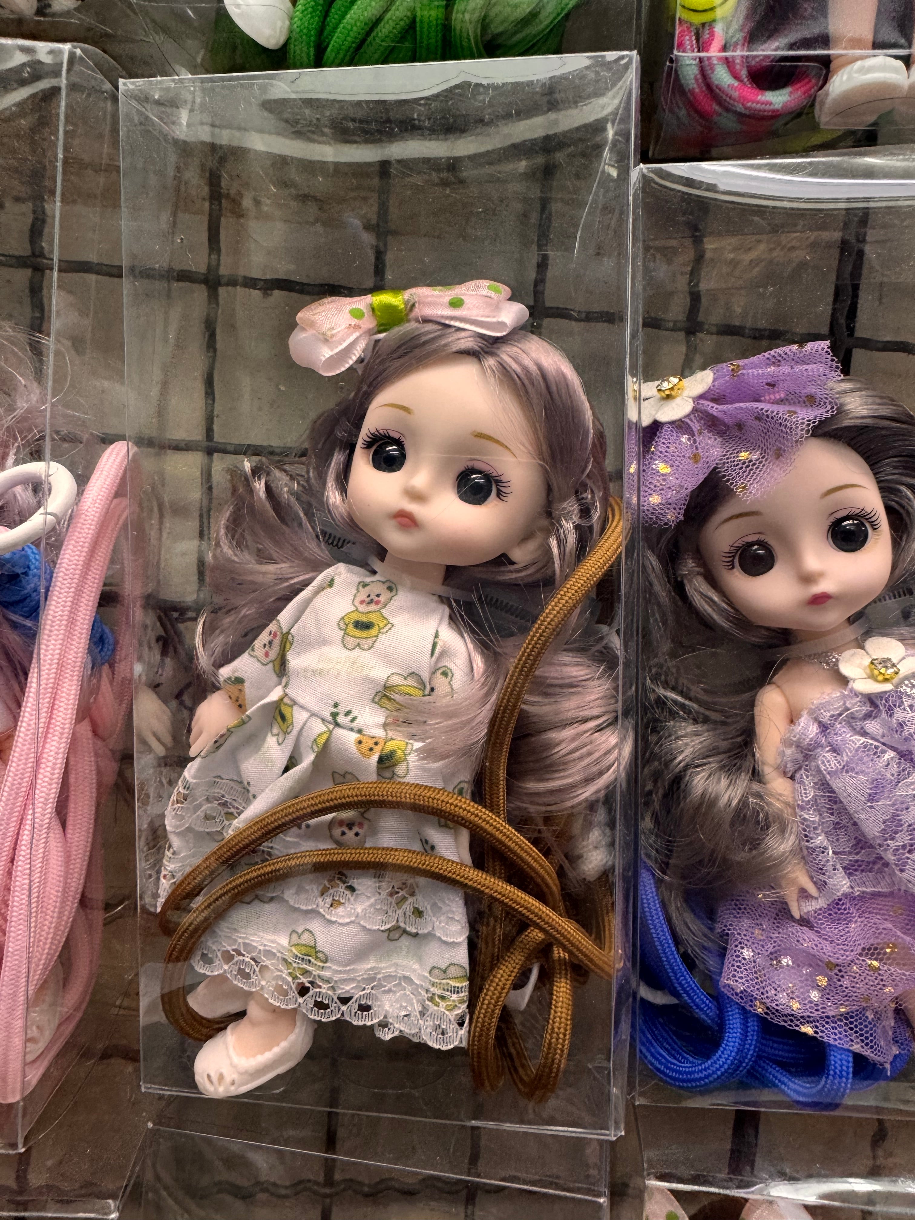 Doll phone holder