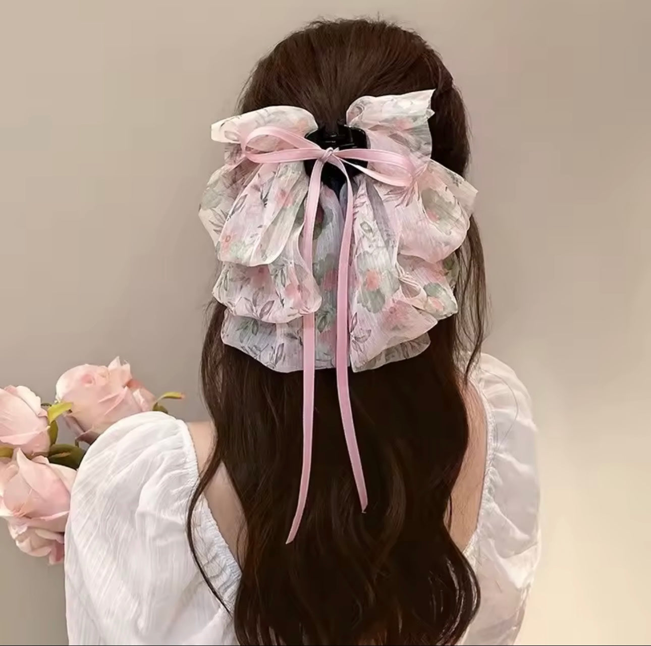 Pink flora bow Clutcher