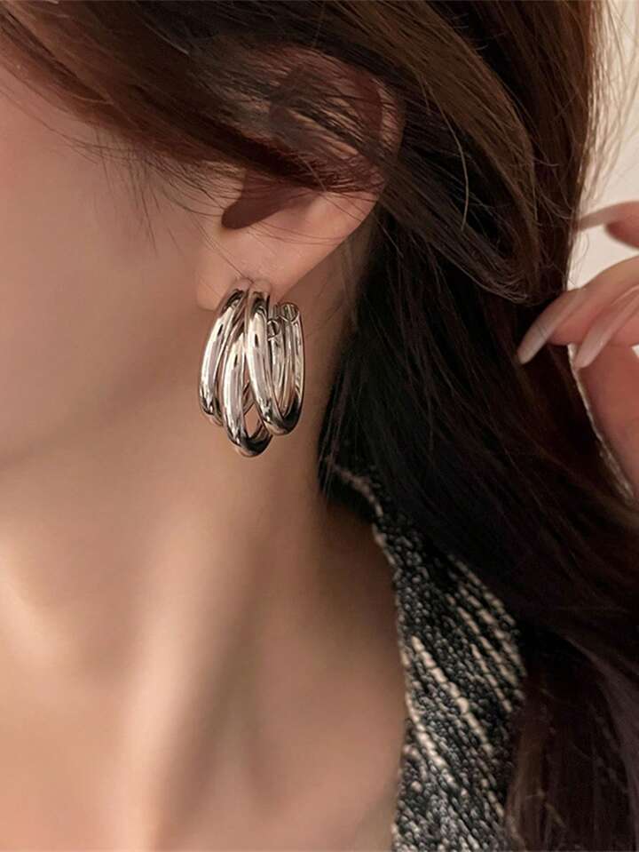 E1 Earings