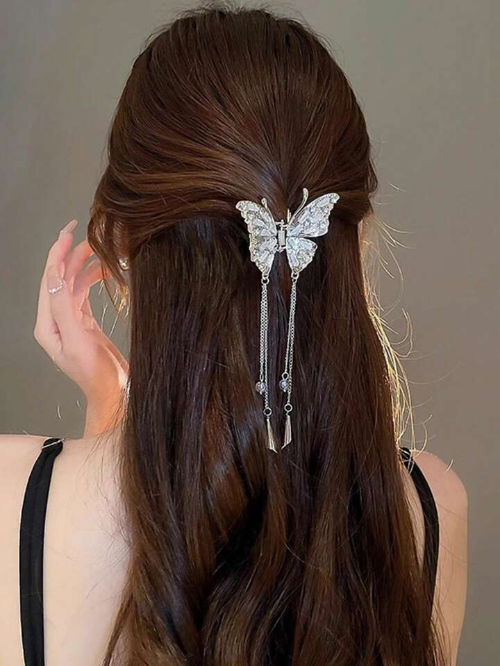 Butterfly tassel Clutcher