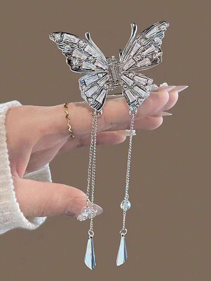 Butterfly tassel Clutcher